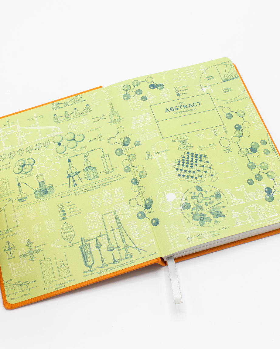 A Chemistry A5 Hardcover Notebook - Dotted Lines by Cognitive Surplus with drawings on it.