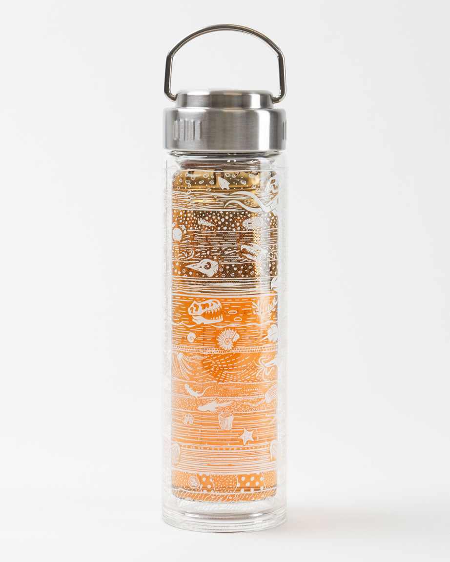 A Cognitive Surplus Core Sample Tea Infuser with a handle.