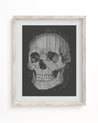 A black and white Skull Medical Illustration Museum Print in a Cognitive Surplus framed frame.