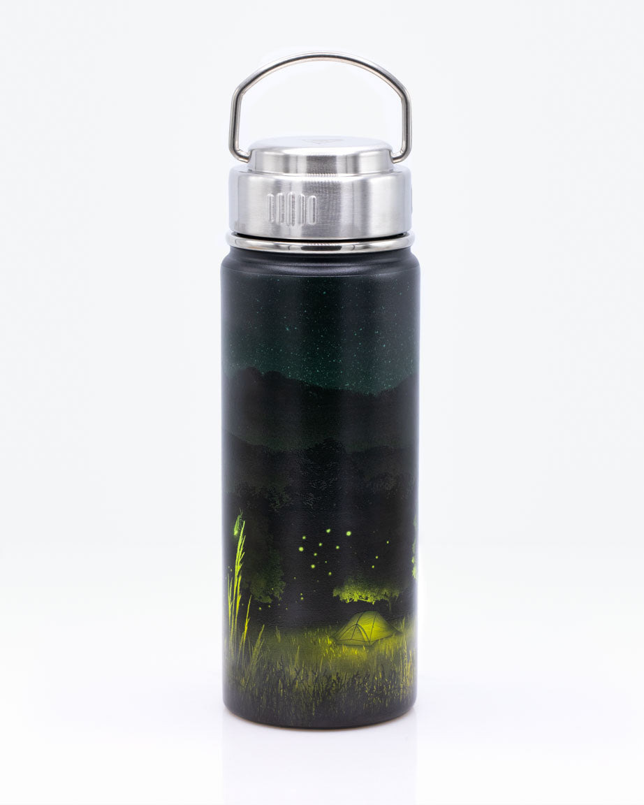 A Firefly Meadow 18 oz Steel Bottle by Cognitive Surplus with a night scene on it.