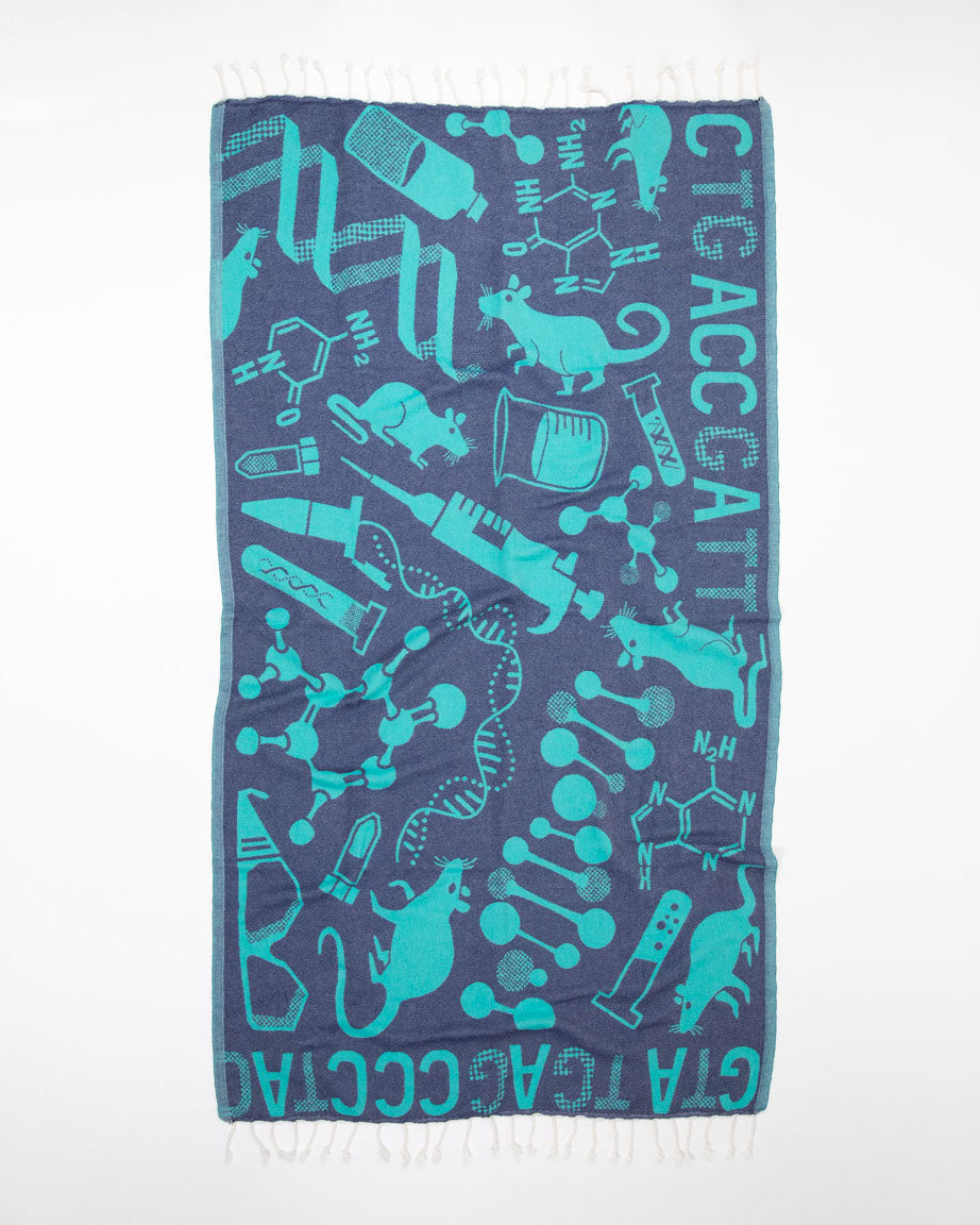 A blue and turquoise Lab Science Turkish Towel with a design on it from Cognitive Surplus.