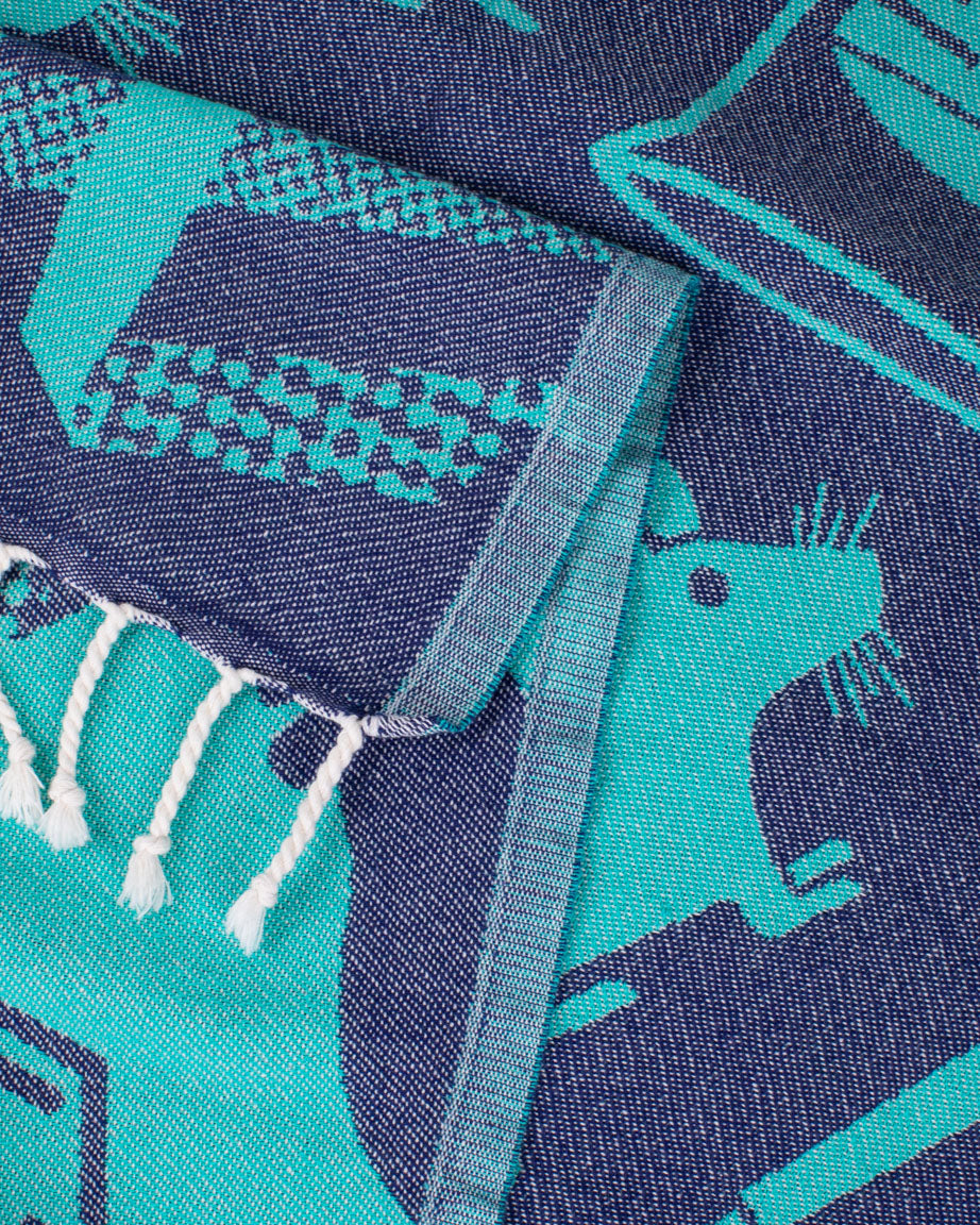 A blue and green Lab Science Turkish Towel with a rat on it by Cognitive Surplus.