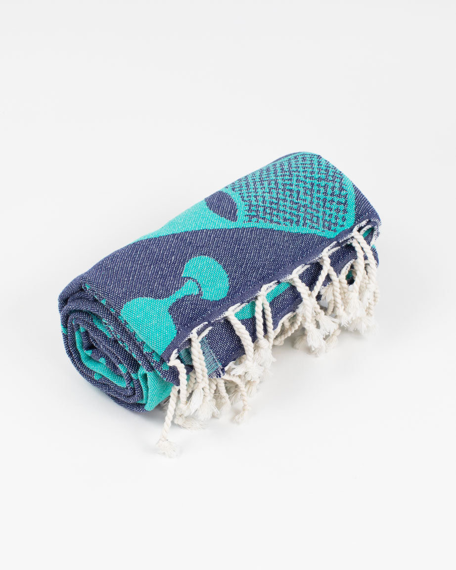 A blue and teal Lab Science Turkish Towel with tassels on it by Cognitive Surplus.