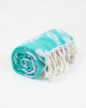 A Go With the Flow: Plankton Turkish Towel made by Cognitive Surplus, with turquoise and white colors and tassels.