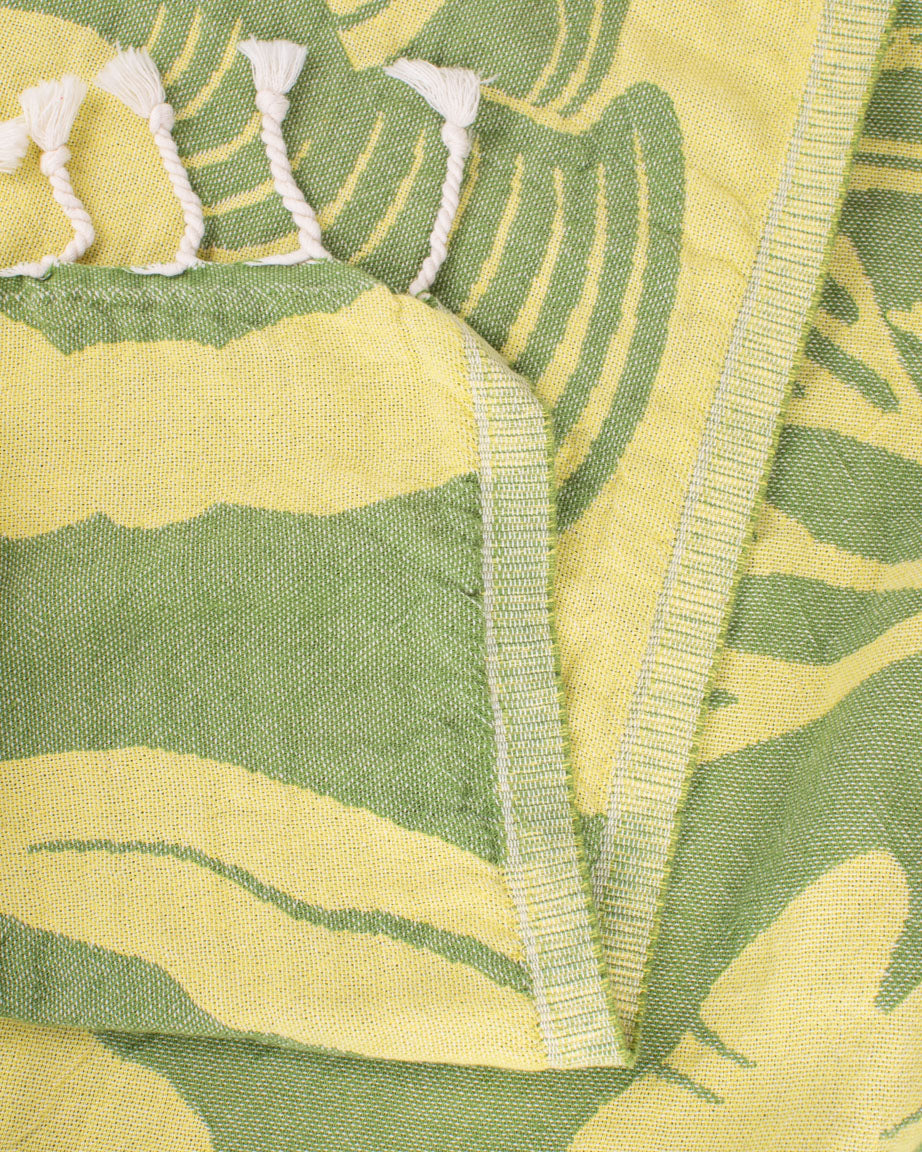 A Seaweed Turkish Towel with tassels from Cognitive Surplus.