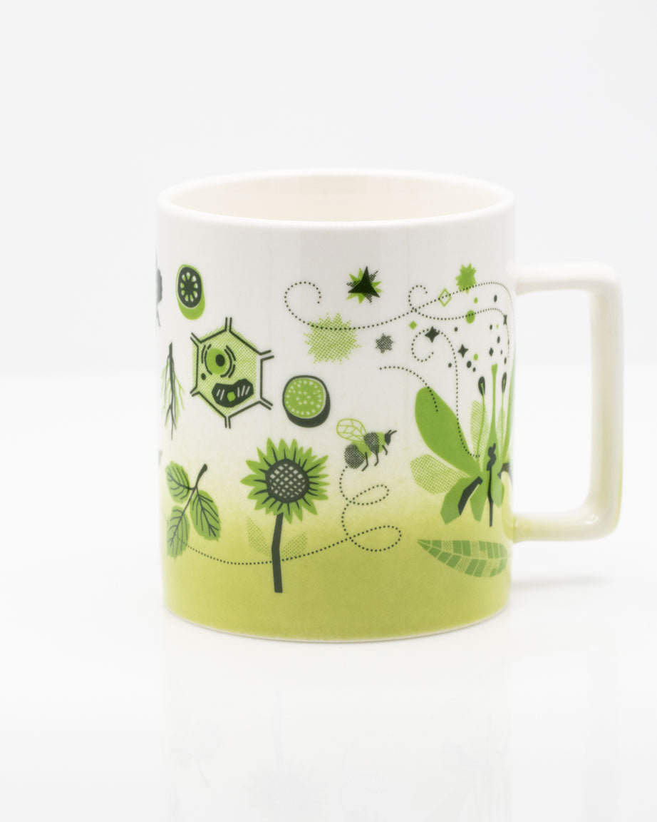 A Retro Botany 11 oz Ceramic Mug by Cognitive Surplus with flowers and plants on it.