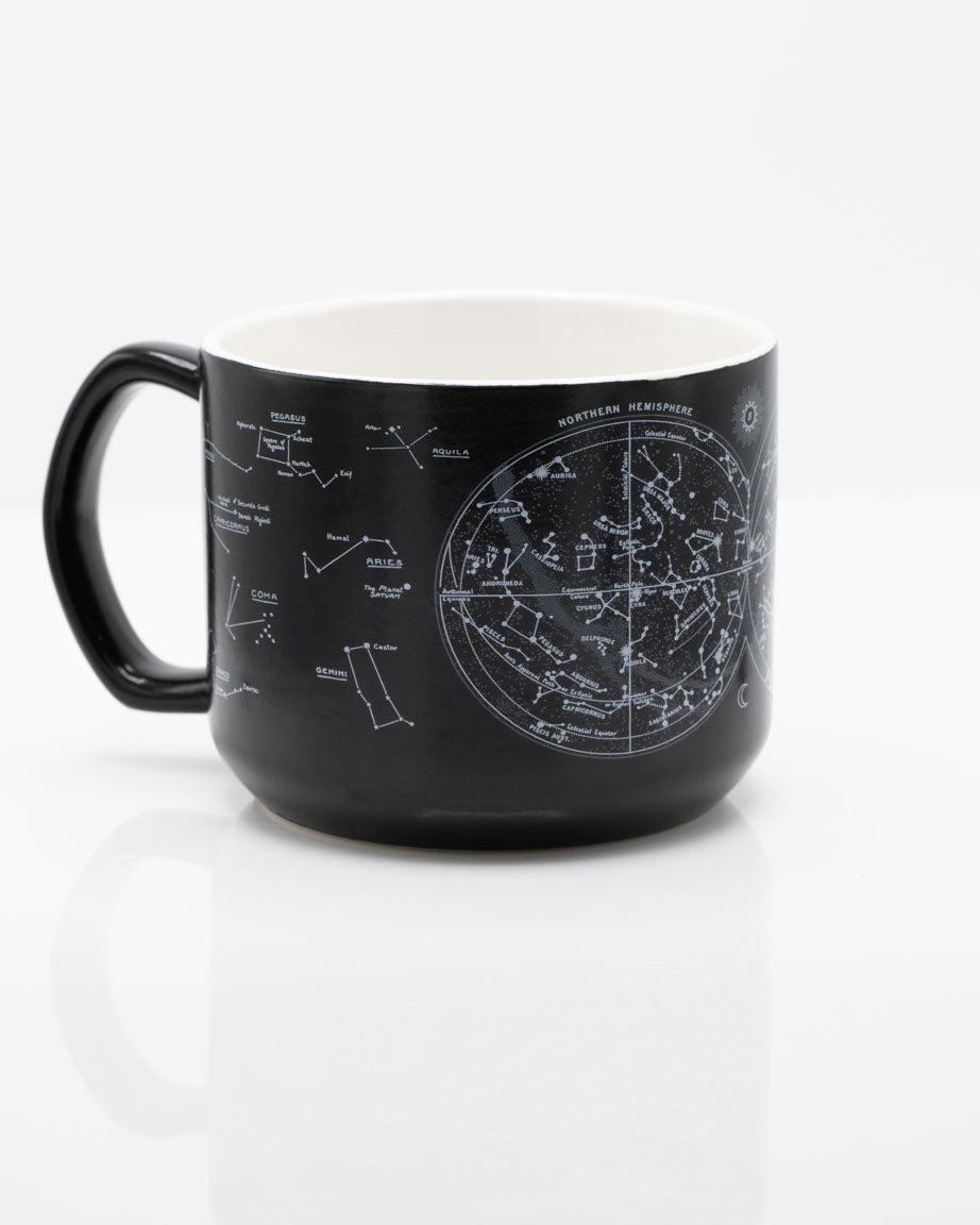 A Night Sky 15 oz Ceramic Mug with a star map on it by Cognitive Surplus.