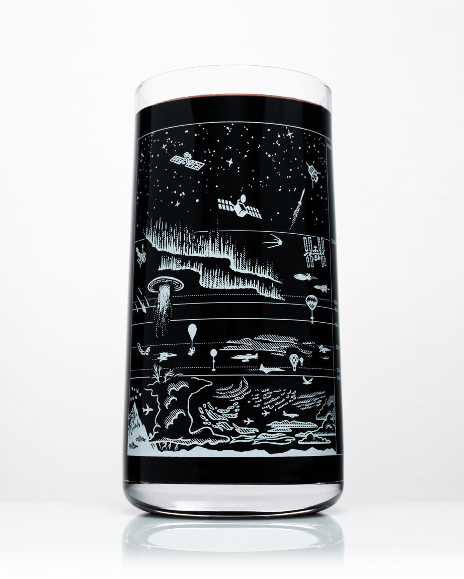 A Cognitive Surplus wine glass with an image of a starry sky.