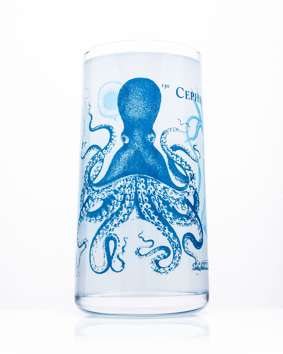 A Monsters of the Deep: Cephalopods Drinking Glass by Cognitive Surplus with an octopus on it.