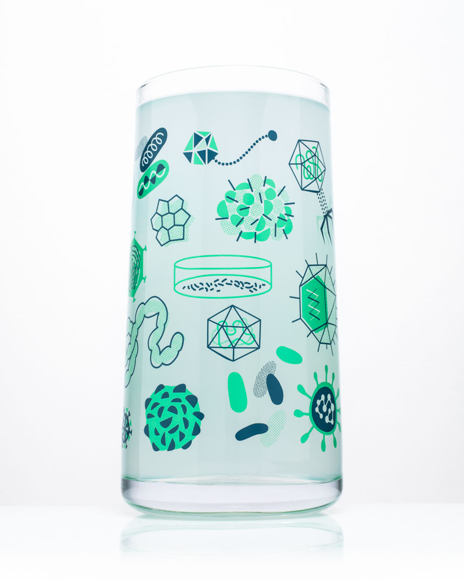 A Retro Microbiology Drinking Glass with a clear liquid and a green and blue design by Cognitive Surplus.