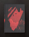 An Into the Earth: Caves Dark Matter Notebook with a red cover and a silhouette of a bat by Cognitive Surplus.
