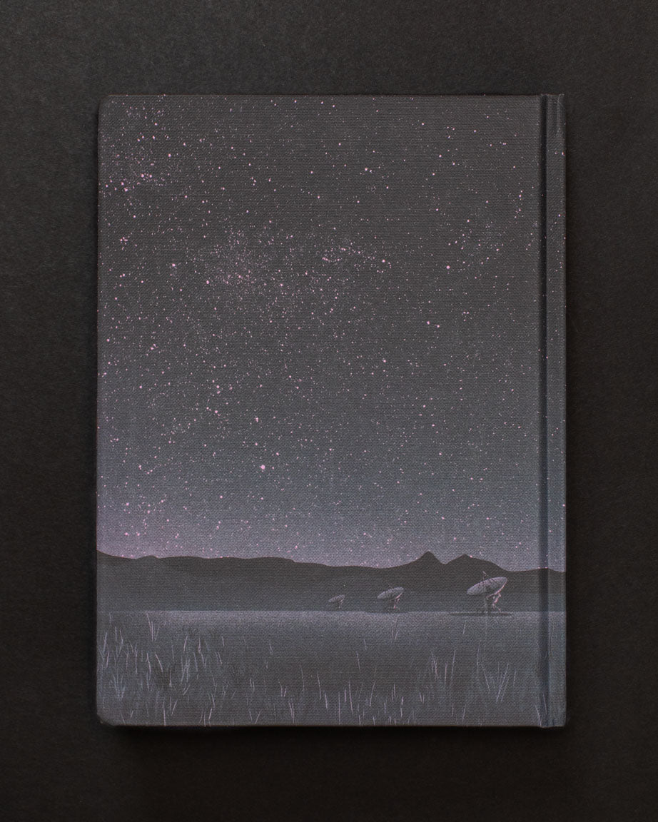 A Turn Skyward: Very Large Array Dark Matter Notebook with a starry sky on it, by Cognitive Surplus.