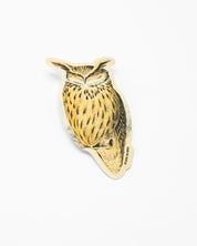 An Eagle Owl sticker on a white surface by Cognitive Surplus.