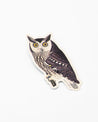 A Cognitive Surplus Mottled Owl Sticker on a white surface.