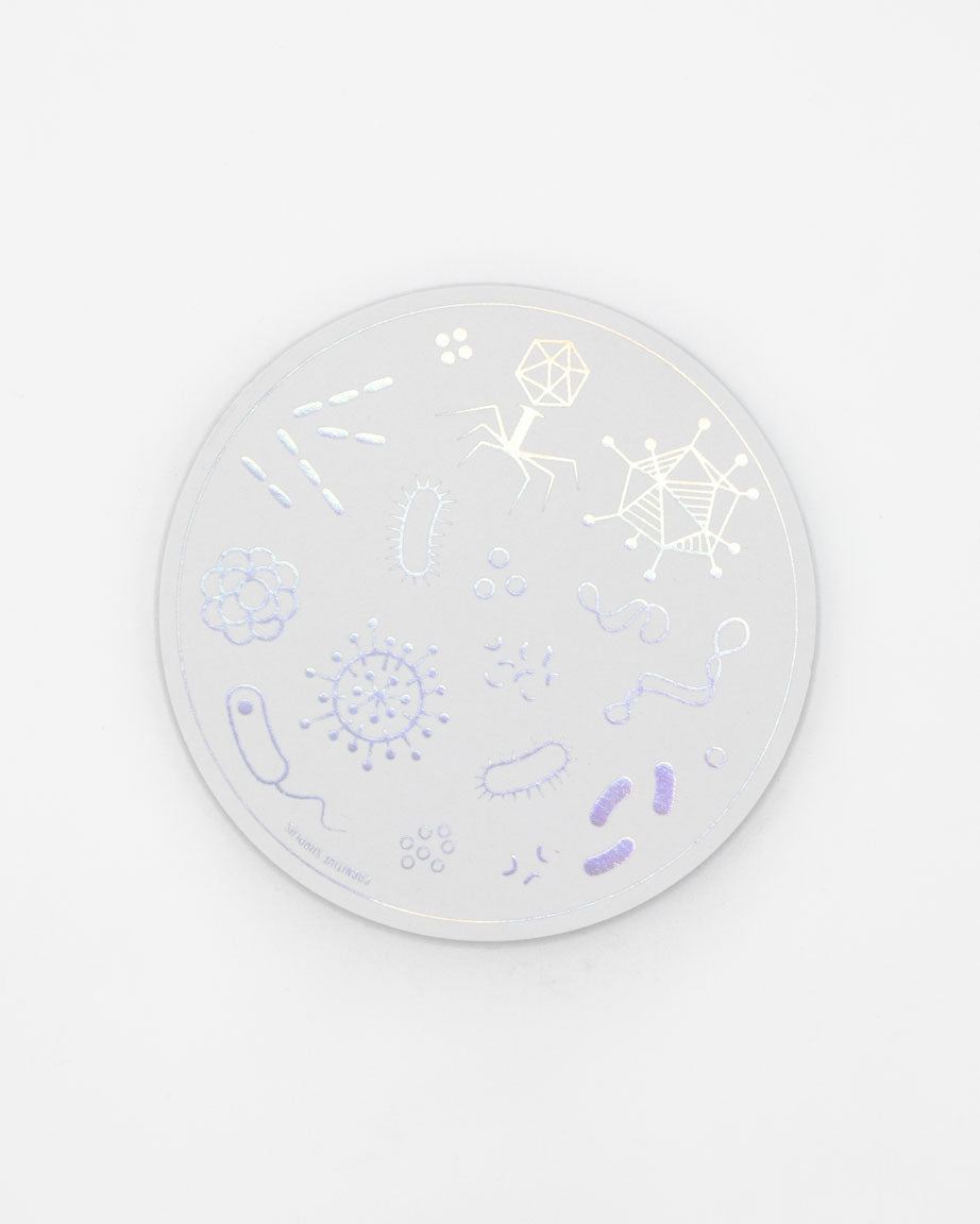 A Cognitive Surplus Petri Dish Sticker with a lot of different designs on it.