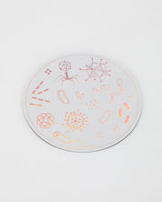 A Cognitive Surplus Petri Dish Sticker with a design on it.