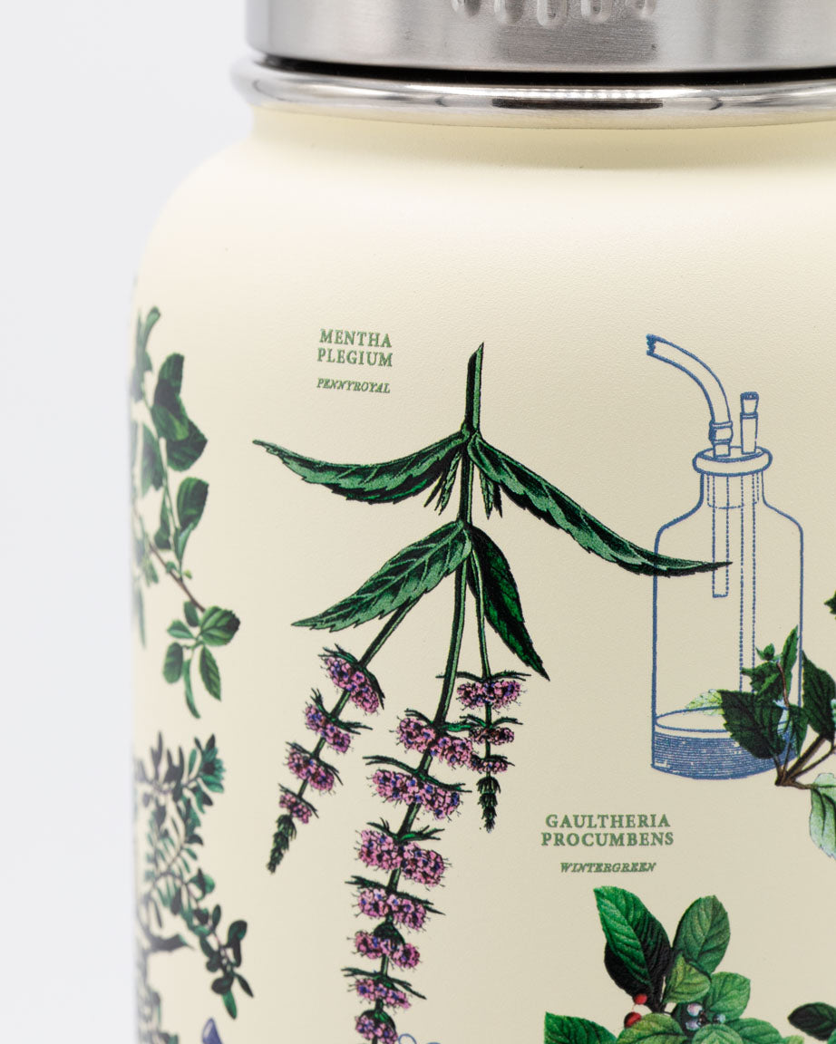 A Cognitive Surplus Botanical Pharmacy 32 oz Steel Bottle with herbs and flowers on it.