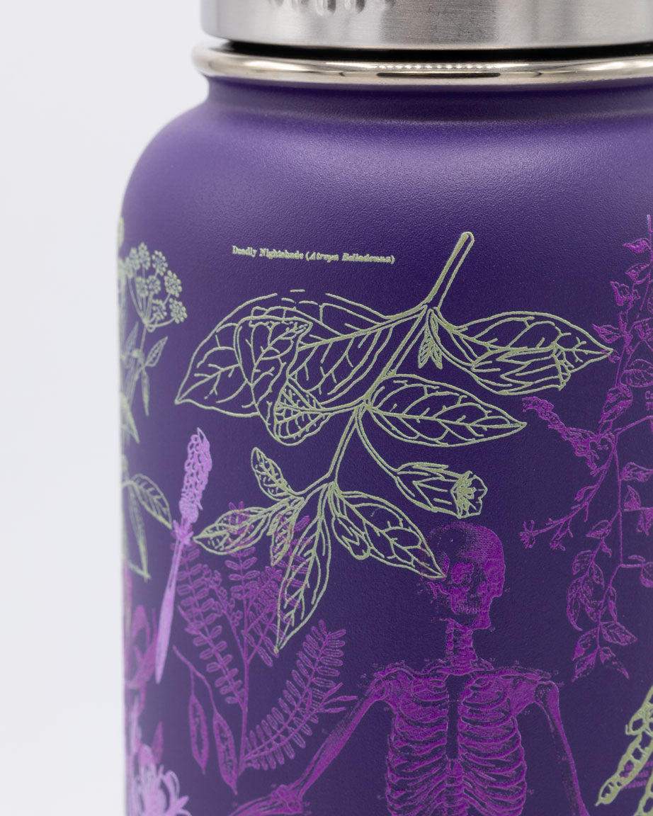 A Cognitive Surplus Poisonous Plants 32 oz Steel Bottle with a skeleton design on it.
