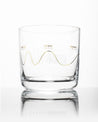 An Electromagnetic Spectrum Whiskey Glass with a wave pattern on it from Cognitive Surplus.