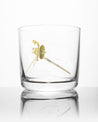 A Voyage to the Unknown Whiskey Glass with a gold design on it by Cognitive Surplus.