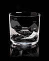 A Mountain Peaks of the World Whiskey Glass with mountains engraved on it by Cognitive Surplus.
