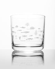A Geologic Time Scale Whiskey Glass with a lot of animals on it, made by Cognitive Surplus.