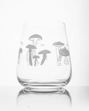 A "SECONDS: Poisonous Mushrooms Wine Glass" with a mushroom design on it, made by Cognitive Surplus.