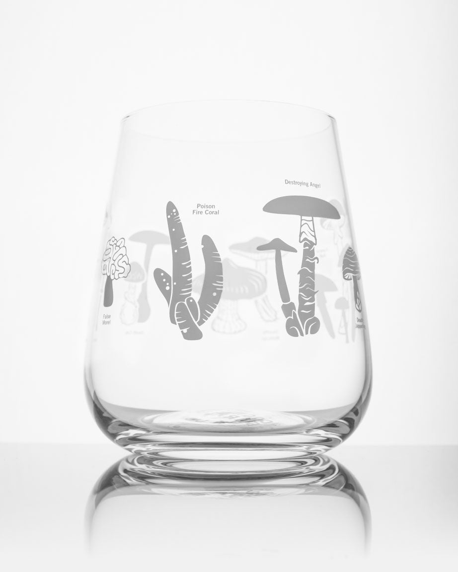 A SECONDS: Poisonous Mushrooms Wine Glass with a mushroom design on it, by Cognitive Surplus.