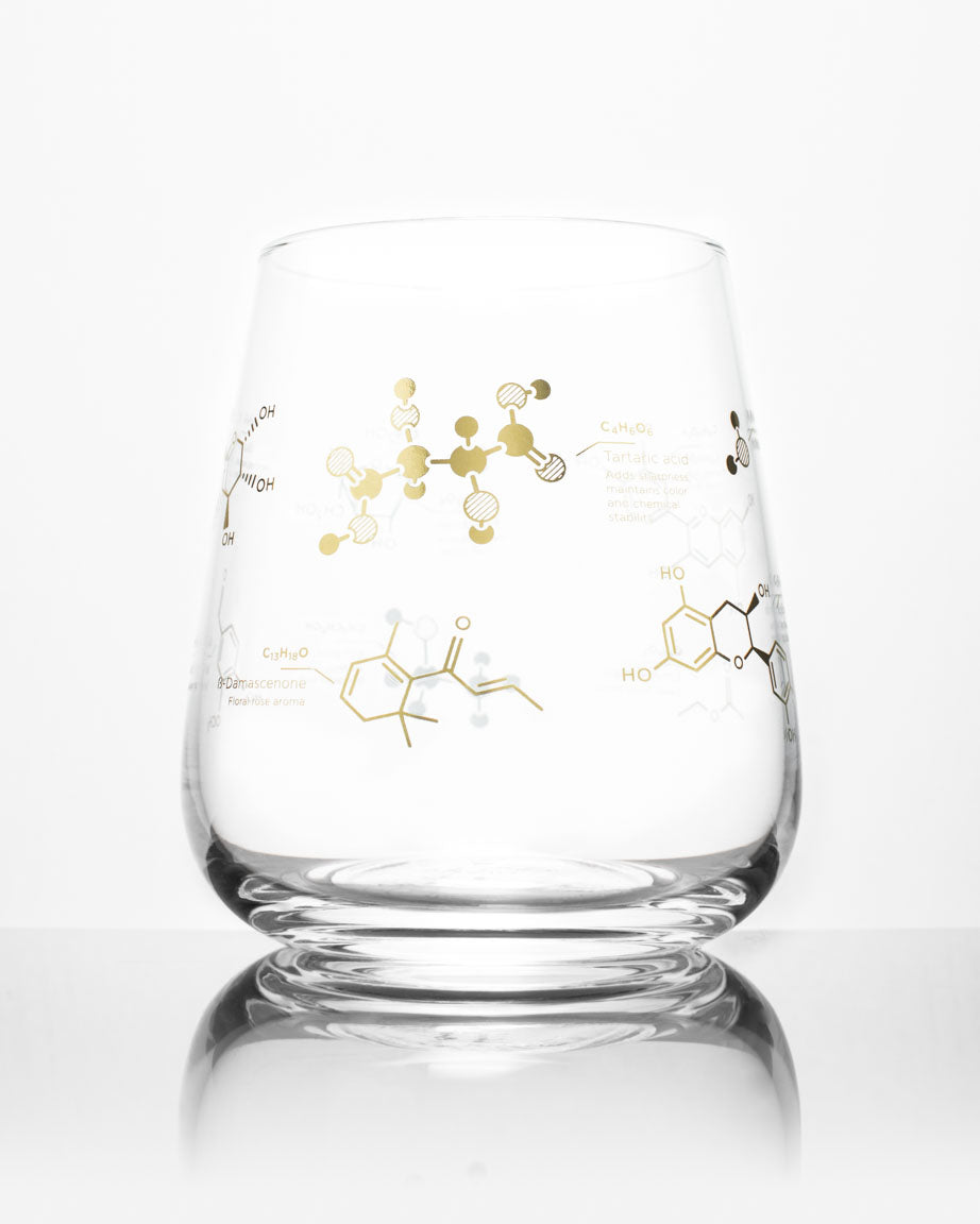 A SECONDS: Chemistry of Wine Glass with a gold design on it by Cognitive Surplus.