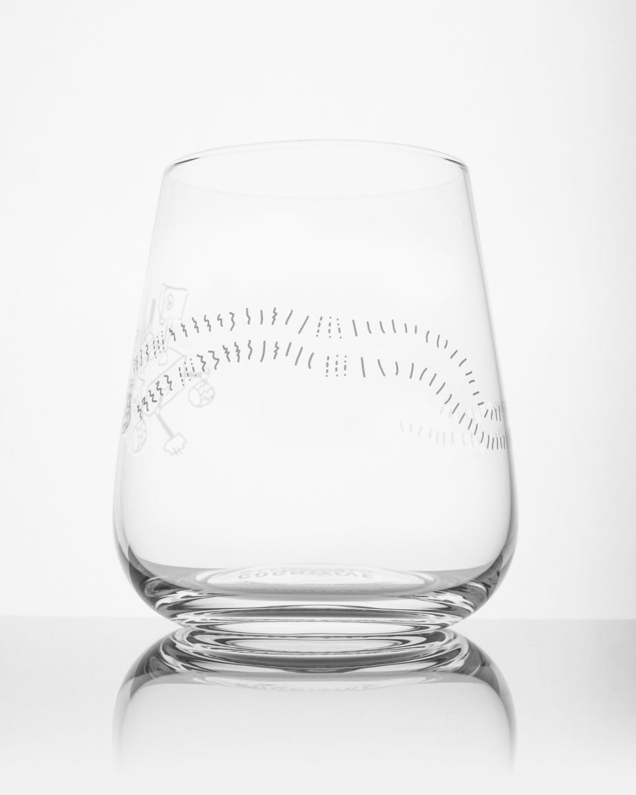 A Mars Rover Perseverance Wine Glass by Cognitive Surplus with a design on it.